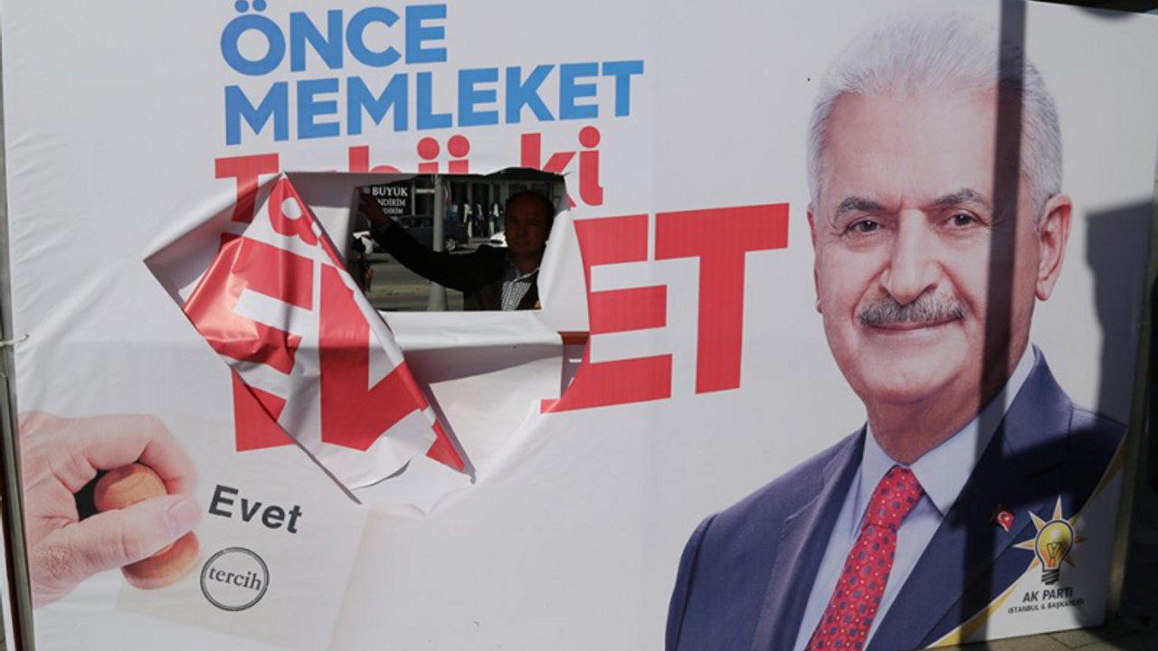 Başbakan'ın afişini yırtmakla suçlanıyorlar