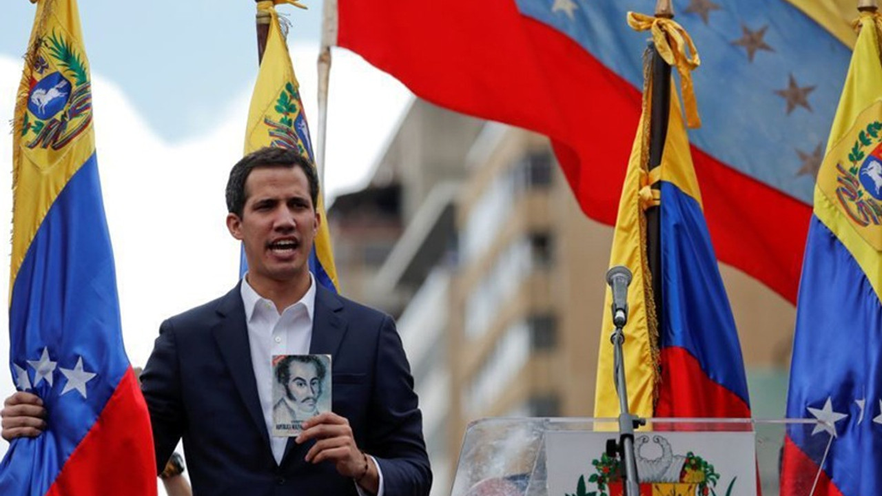 Venezuela’ya dönen Guaido, sokağa çıkma çağrısı yaptı