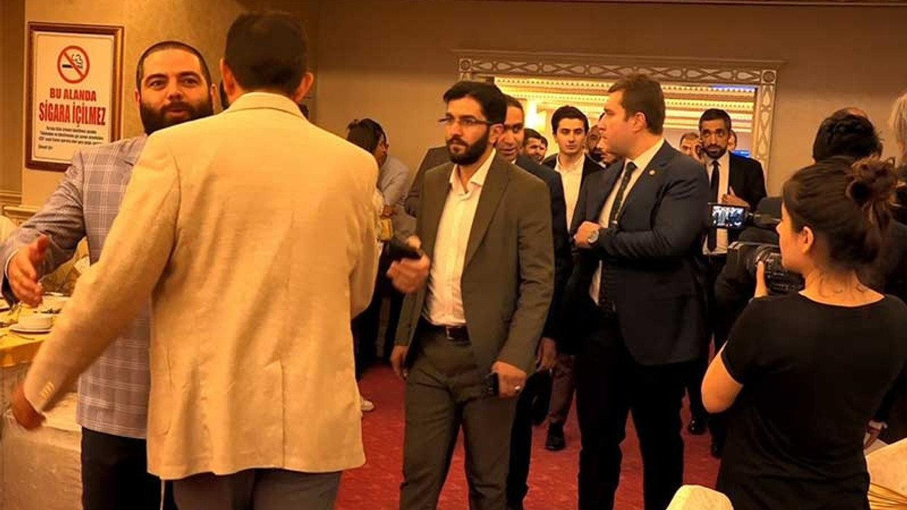 'Satırlı' Taha Ün, Davutoğlu'nun iftarında