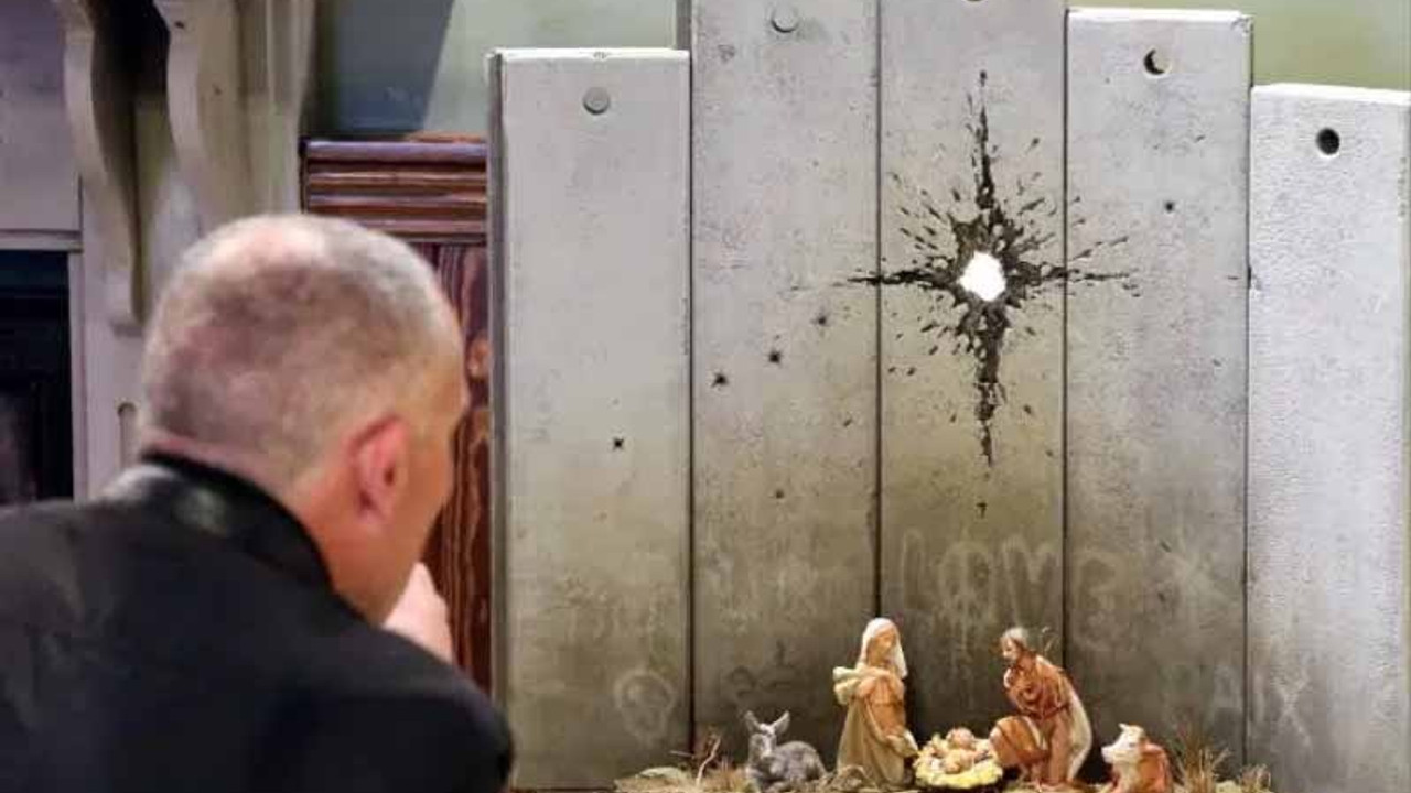 Banksy Batı Şeria'da: Ayrım duvarı önünde doğan İsa