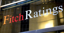 Fitch, küresel ekonomiye ilişkin büyüme tahminini düşürdü