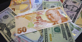 Dolar, küresel piyasalardaki dalgalı seyri izliyor: Bugün Fed, yarın TCMB raporu takip edilecek