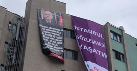 MHP'den pankarta pankartla yanıt