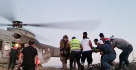 Muğla’da yangına müdahale eden orman işçilerinin üzerine yanan ağaç devrildi