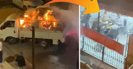 Yanan aracını söndürürken, görenler okeye devam etti