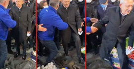 Esnaf, Kılıçdaroğlu'nun önüne 'Kırmızı halımız yok' diyerek montunu serdi