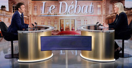 Macron'dan Le Pen'e: Başörtüsü yasağı iç savaş çıkarır