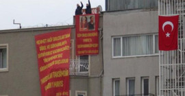 Önlemleri aşarak Taksim Meydanı'na pankart astılar