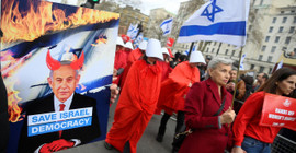 Netanyahu'yu İngiltere'de yüzlerce kişi protesto etti