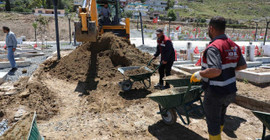 Hatay'daki yağışta depremzedelerin mezarları zarar gördü