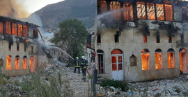 Hatay'da depremde ağır hasar alan 2 katlı bina yandı