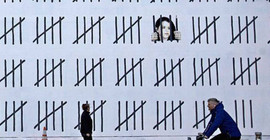 Bansky, tutuklu gazeteci Zehra Doğan'ı New York duvarlarına resmetti