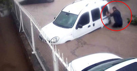 Selde sürüklenen aracını iple bağladı