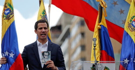 Venezuela’ya dönen Guaido, sokağa çıkma çağrısı yaptı