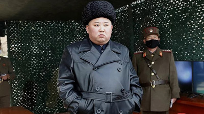 Koronavirüs: Füze denemesi izleyen Kim Jong Un tedbire uymadı