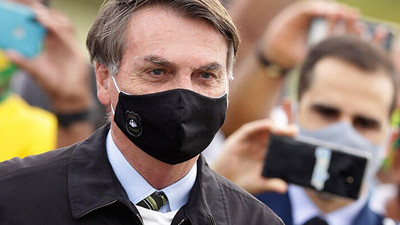 Bolsonaro: Coronavirus'e yakalanmak yağmura yakalanmak gibi, hepimiz ıslanacağız