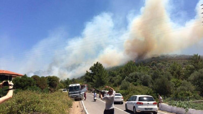 Çeşme'de önce orman yangını, sonra yol çalışması