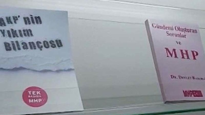MHP Genel Merkezi'nde görüntülenen 'AKP'nin yıkım bilançosu' ve 'yolsuzluk süreci' kitapları gündem oldu