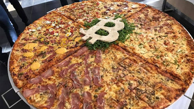 Bitcoin hızla yükselince iki pizzaya 613 milyon dolar ödemiş oldu