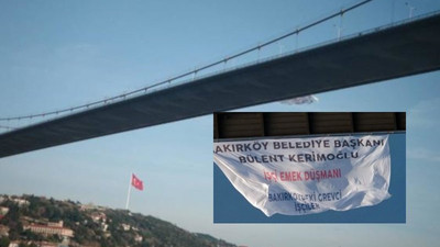 Grevdeki işçiler köprüye pankart astı: Bülent Kerimoğlu emek düşmanı