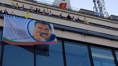 AFP binasına Öcalan posteri asıldı