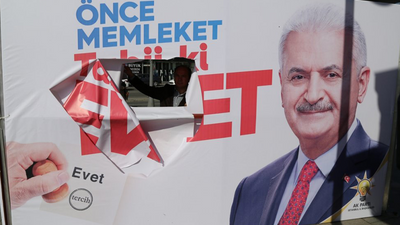 Başbakan'ın afişini yırtmakla suçlanıyorlar