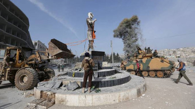 Afrin'de heykelleri kurşunlayıp yıktılar