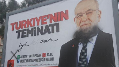 Karamollaoğlu'nun afişlerine saldırı