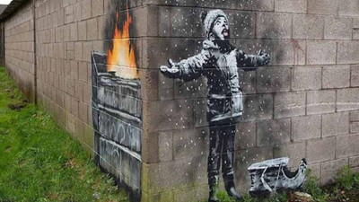 Banksy'nin garaj duvarına yaptığı resim 100 bin sterline satıldı