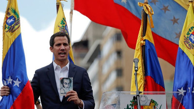 Venezuela’ya dönen Guaido, sokağa çıkma çağrısı yaptı