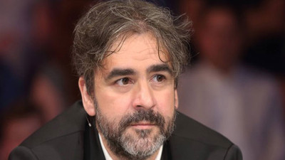 Gazeteci Deniz Yücel'e tutuklama istemi