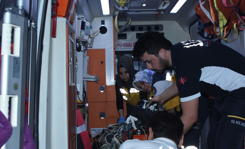 Eşini çocuklarının gözü önünde öldürdü